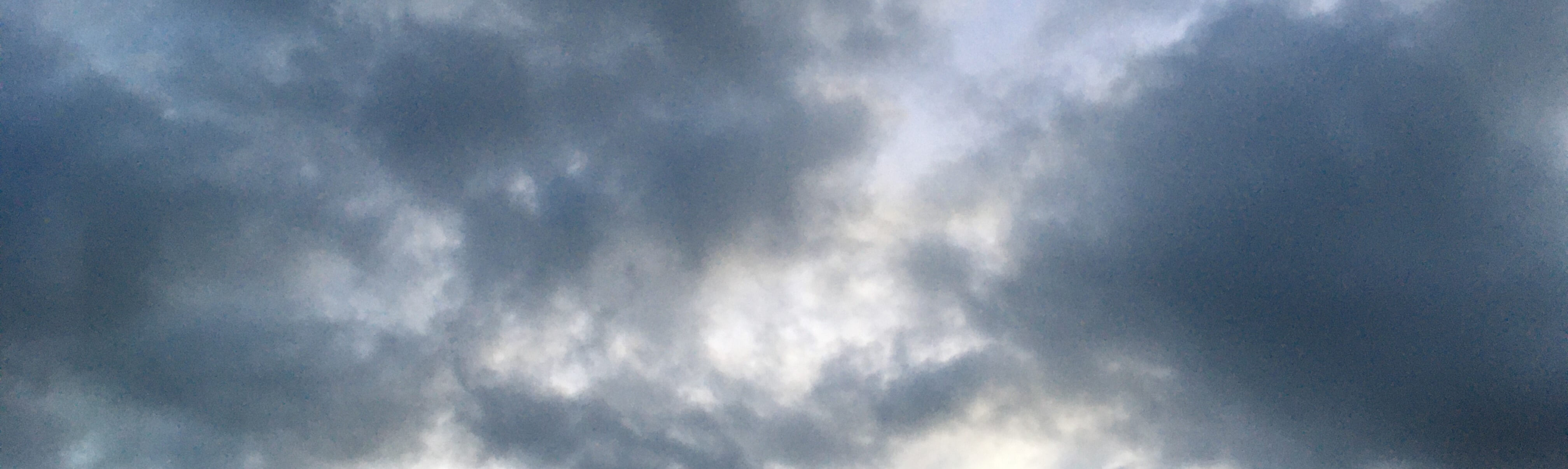 dark clouds with sunlight breaking through